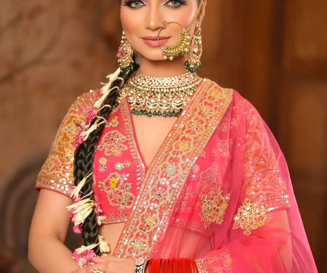 This close-up captures the essence of my luxury bridal service. Notice the flawless, dewy skin, the sharp winged eyeliner, and the perfectly blended eyeshadow that makes her eyes the centerpiece of this fairytale look.