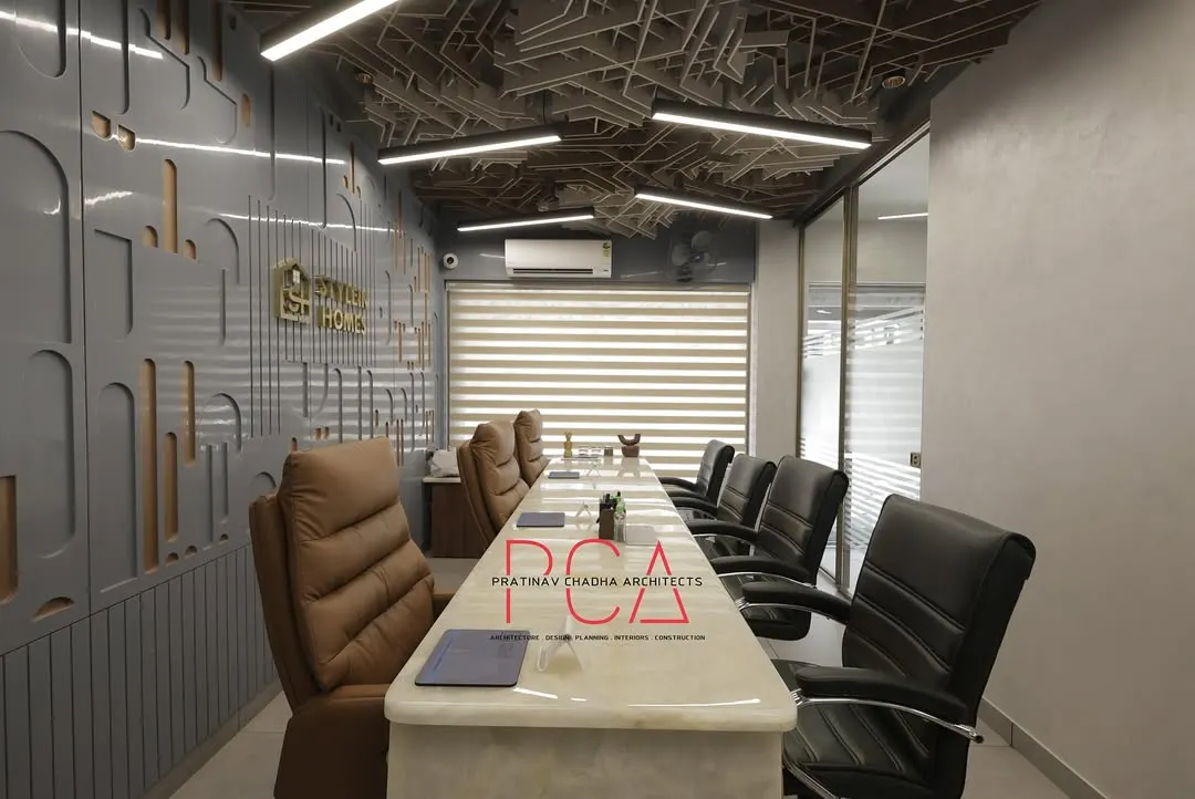 This conference room for StyleIn Homes in New Delhi showcases my approach to creating innovative corporate spaces. The design is centered around free-flowing shapes, featuring interweaving acoustic ceiling panels that are both visually stunning and highly functional for sound management in a busy office.
