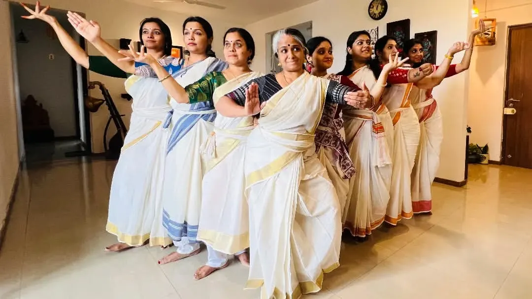Our Samarpana family, united in dance. This group pose captures the synchronicity and collective energy we bring to every performance, a true 'samarpanam' or offering at the lotus feet of the divine.