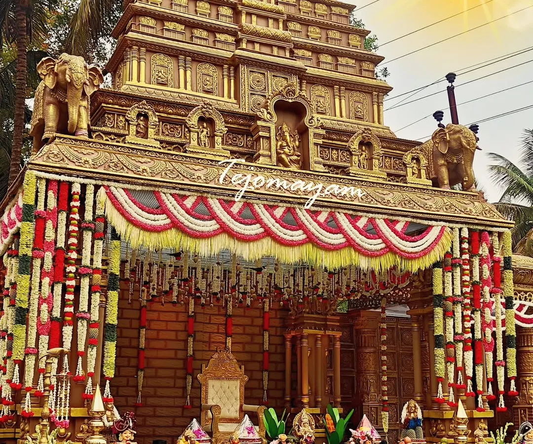 I believe in creating an atmosphere that feels truly sacred. This grand temple-themed mandap, with its intricate architectural details and traditional floral garlands, was designed to bring the divine essence of a temple to a wedding celebration.