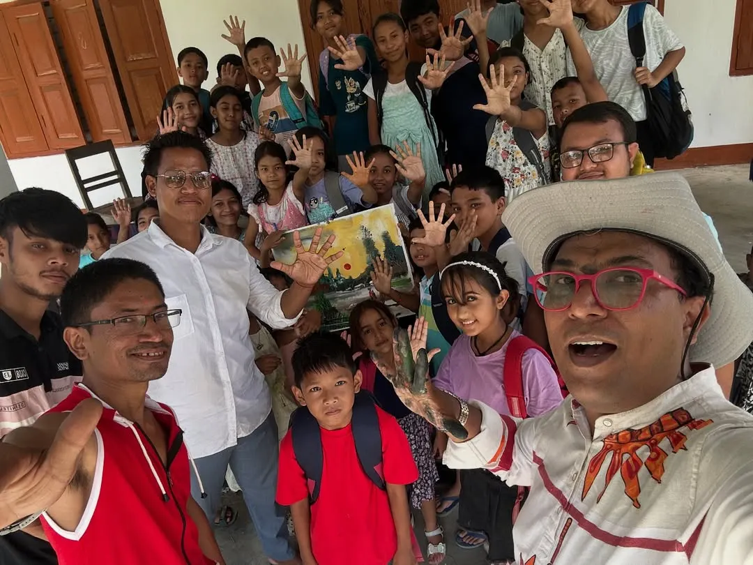 This is the best part of my job. A happy selfie with my lovely students and their parents after a fantastic workshop at Gogamukh College Auditorium in Dhemaji. The energy and excitement here is why I love teaching art.