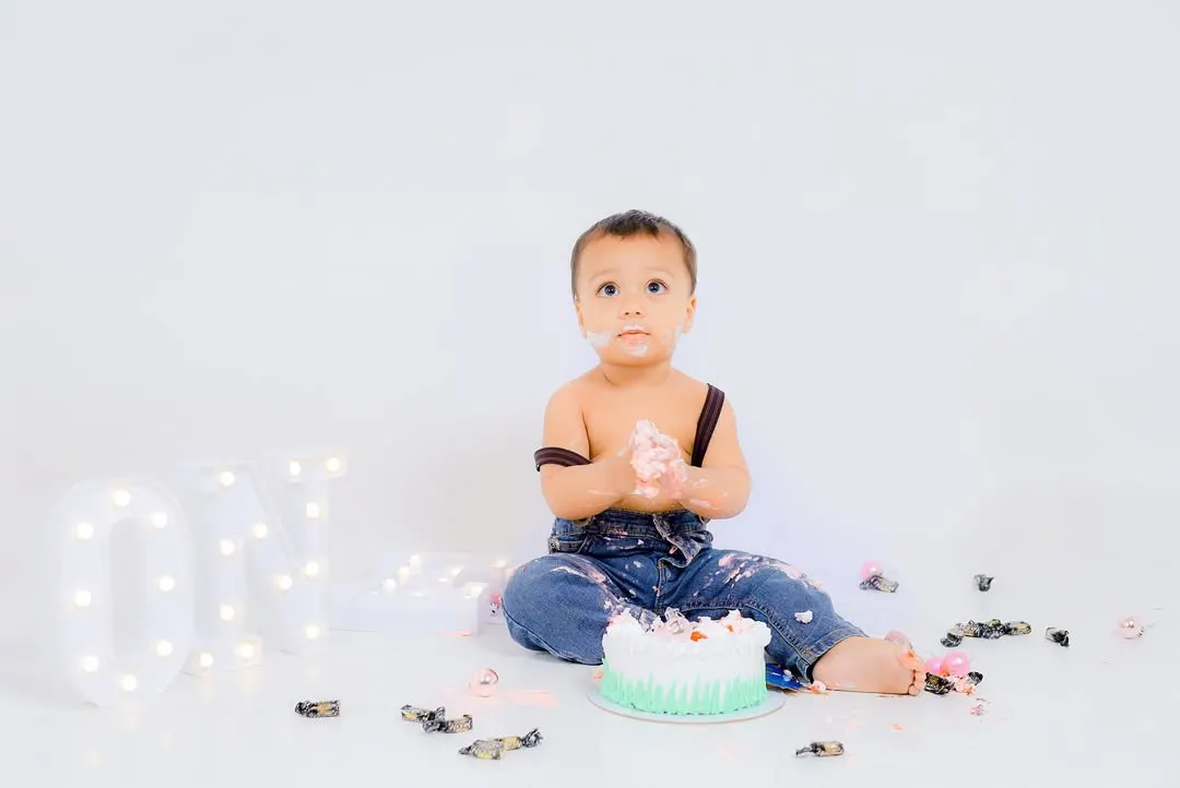 Capturing the pure joy and mess of a first birthday cake smash in my studio. These sessions are all about letting kids be kids.
