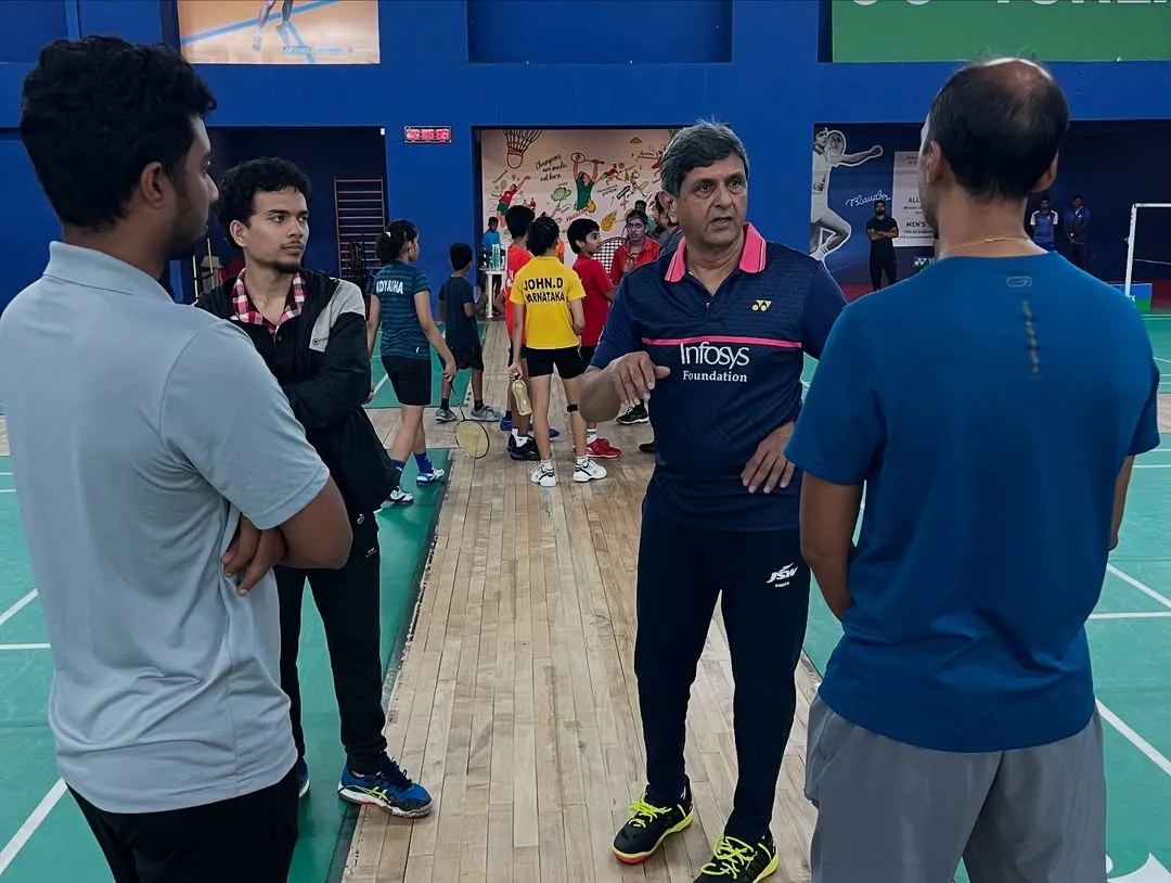 Learning directly from a legend. Prakash Padukone provides invaluable, firsthand insights to our coaches during a training session, sharing the strategic thinking and technical wisdom that made him a world champion.