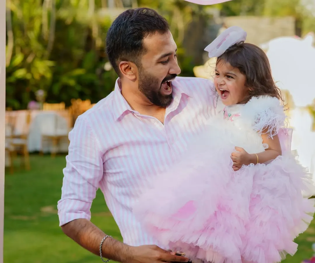 The pure, uninhibited laughter between a father and his daughter. Our goal is to capture the genuine connection and joy that fills the air during your family's special occasions. These are the candid moments you will look back on and smile about for years.