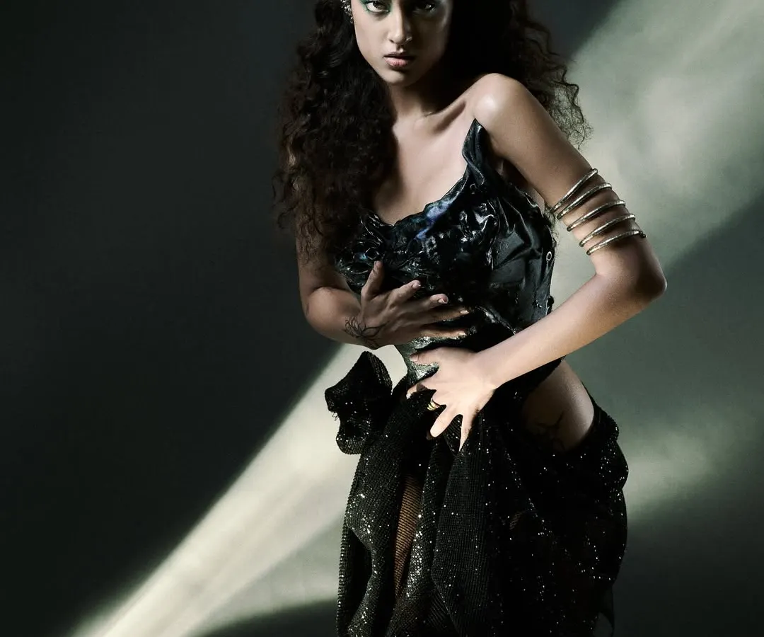 This is what I mean when I say light is my weapon. We created this shot using an optical snoot to project a sharp ray of light, cutting through the darkness. It’s about precision, control, and creating drama from a simple setup. This is the kind of technical execution that defines my work.