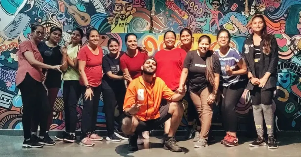 My Zumba squad is my family. We push each other, celebrate our progress, and always have a blast. This is a shot of one of our awesome ladies-only batches after a killer session against our studio's graffiti wall.