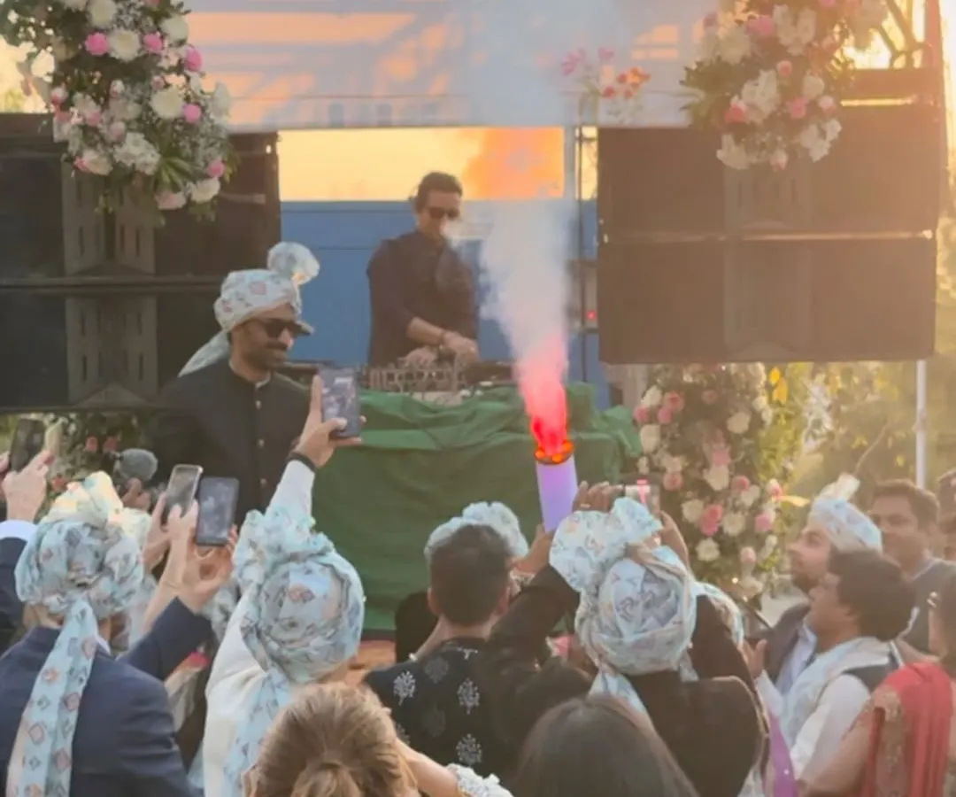 My 'DJ on Wheels' setup is how we turn a traditional baraat into a full-blown moving party. Here, you can see the groom's procession transformed into an unforgettable celebration right on the street, complete with CO2 jets and non-stop music.