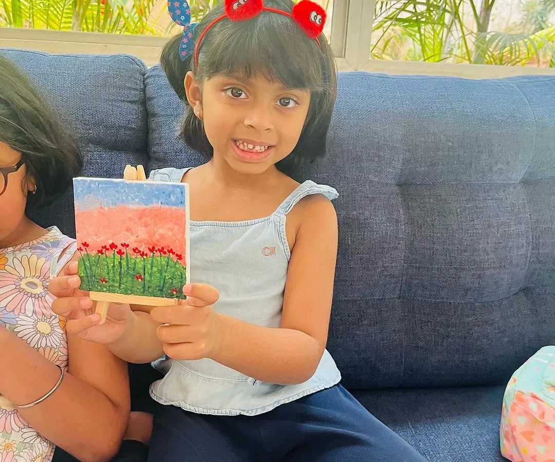 Every child is an artist. Here, we're exploring colours on a tiny canvas, complete with a mini easel. These mini masterpieces are perfect for kids to take home and display.