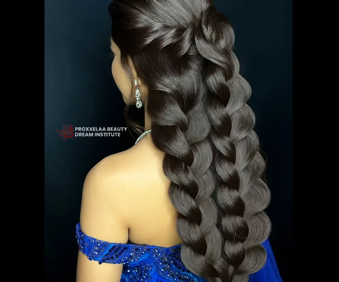 It's all in the details. Our hairdressing course teaches students how to create complex, elegant styles like this multi-strand pull-through braid, perfect for weddings and grand occasions.