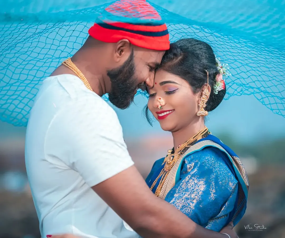 I specialize in capturing the unique spirit of Agri-Koli culture. This pre-wedding photo, with the fishing net and traditional outfits, celebrates a heritage full of life and colour against a beautiful coastal backdrop.