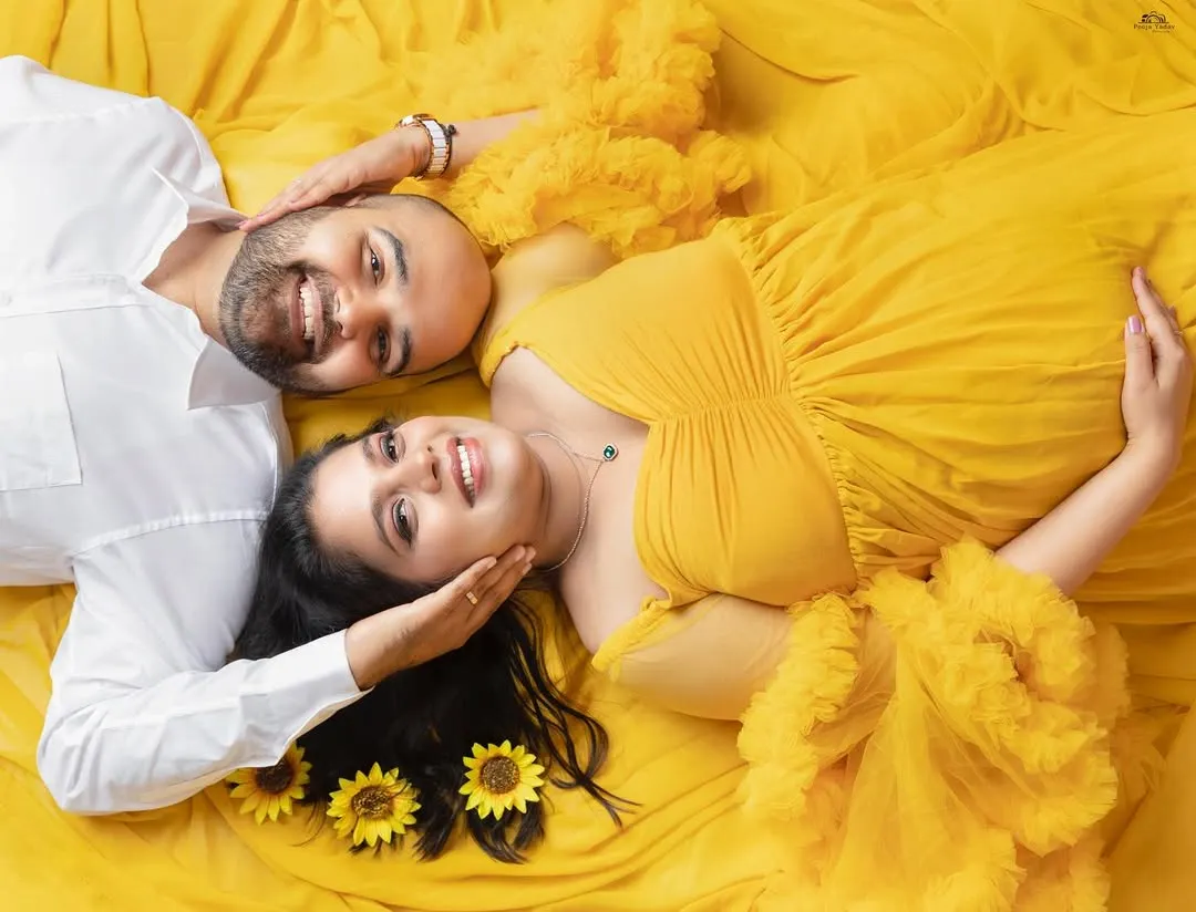 This is what pure happiness looks like. I love this unique top-down perspective for couple maternity sessions. It captures the intimate bond and shared excitement as you both look forward to your new beginning.