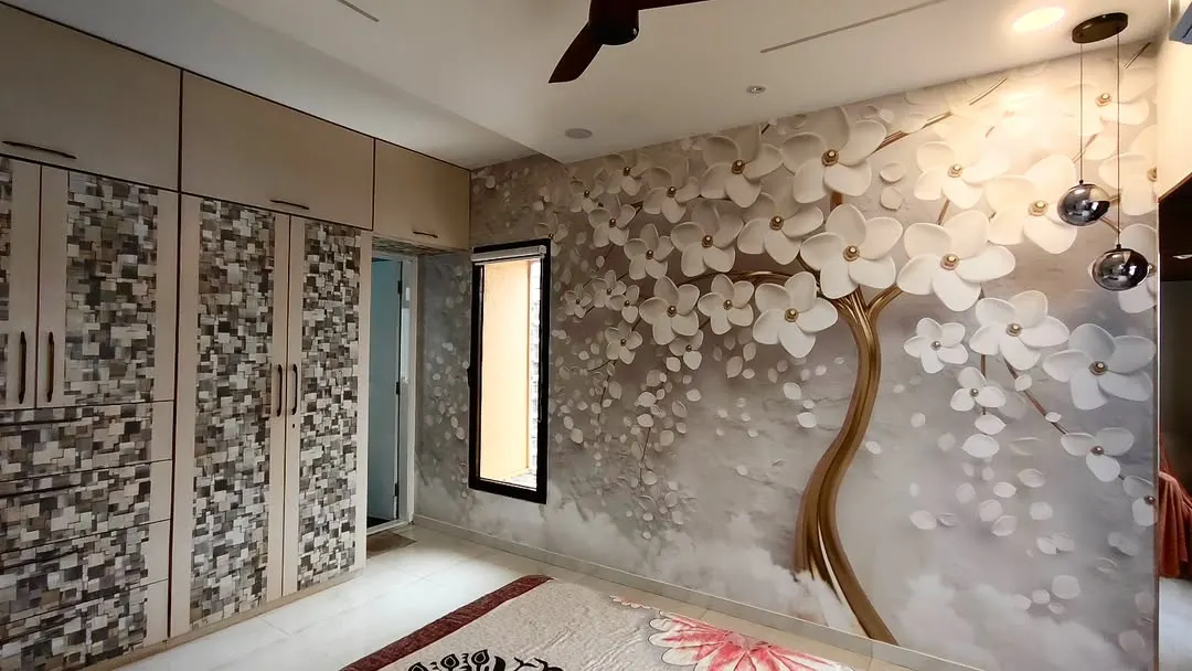 Here is a popular 3D floral tree wallpaper that I installed in a Goregaon bedroom. The design adds depth and a serene feeling to the room, making the wall behind the bed a stunning focal point.