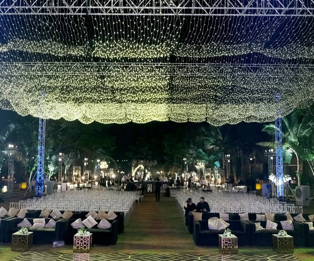For this Sangeet, we transformed an outdoor space into a celestial wonderland. A vast canopy of thousands of fairy lights created a star-studded sky, setting a dreamy, glamorous tone for a night of celebration and dance.
