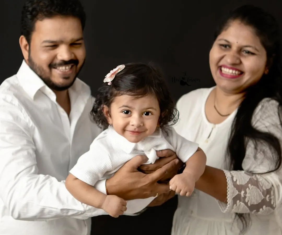 Pure happiness in my Navi Mumbai studio. The simple black backdrop makes your family's smiles and laughter the true masterpiece. These are the timeless portraits you will cherish forever.