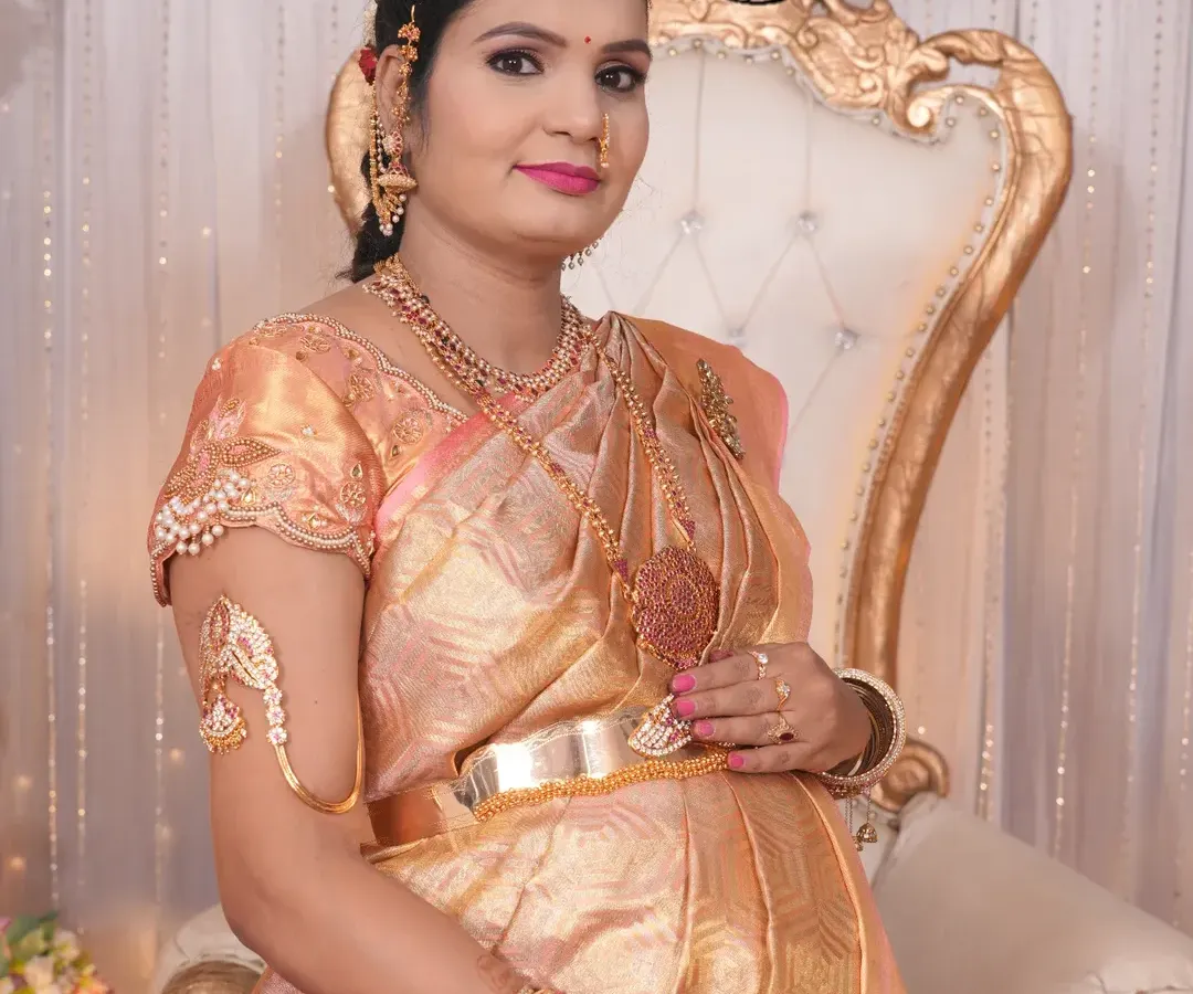 Celebrating a special Seemantha (baby shower) with this radiant mom-to-be. I created a traditional look with glowing skin, defined eyes, and a bright pink lip to match her beautiful tissue silk saree.