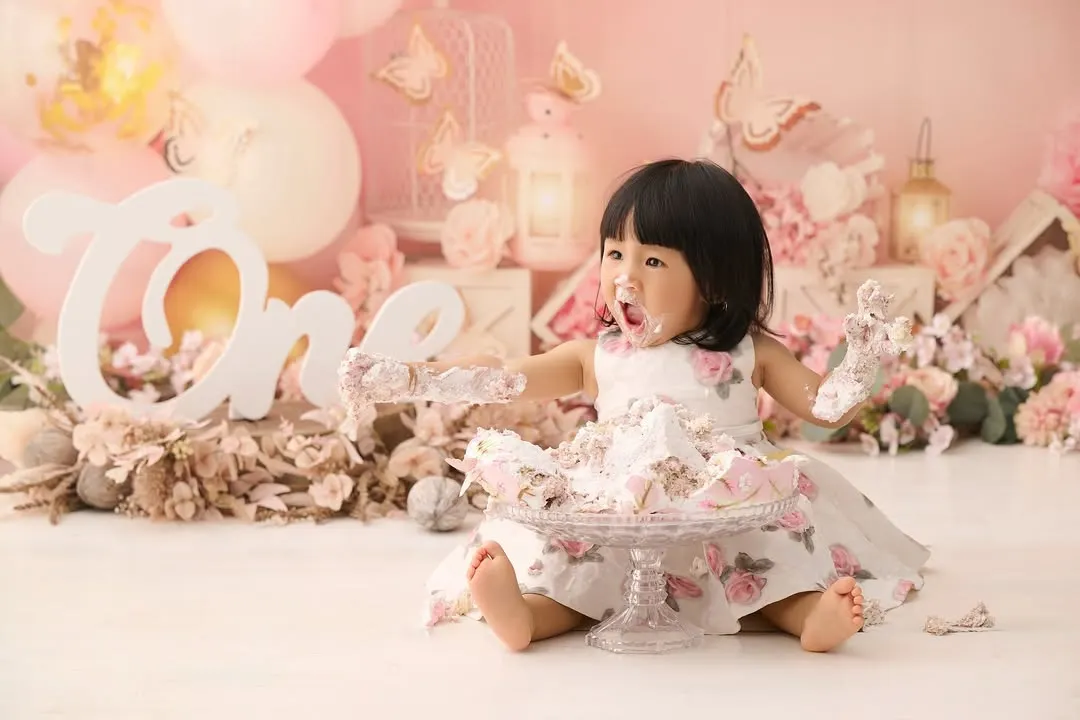 Nothing says "first birthday" like the pure, messy joy of a cake smash. We capture all the fun as your little one explores their first birthday cake in our beautifully styled setups.