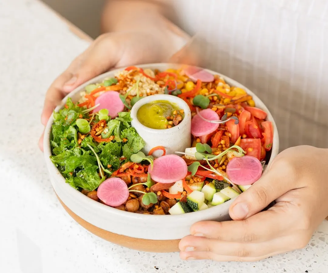 This is what our food is all about: colorful, fresh, and packed with nutrients. We design every dish, like this vibrant nourish bowl, to be good for your gut and a treat for your eyes.