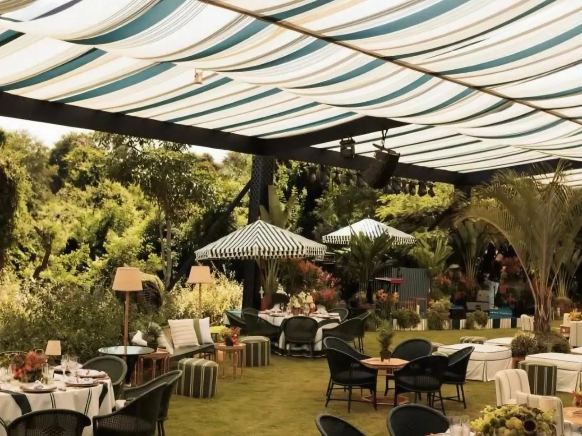 I believe every celebration should feel effortless and chic. For this 30th birthday garden soiree, I used striped fabric canopies, lush greenery, and comfortable lounge seating to create a relaxed yet sophisticated atmosphere for an outdoor luncheon.