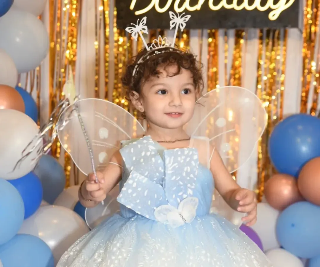 A magical portrait of the birthday girl dressed as a fairy, complete with a wand and wings. I love creating these special, posed shots that capture the theme of your child's party and their adorable personality.