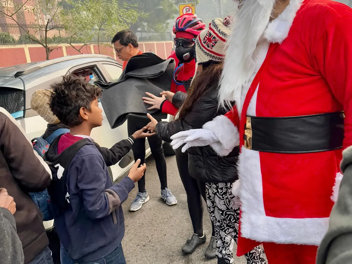 It's more than just a ride, it's about spreading joy. Here we are during our annual Christmas ride, dressed as Santa and handing out warm blankets to those in need on the streets of Delhi.
