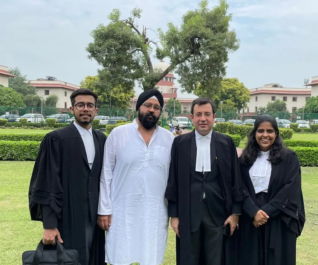 A landmark moment in my career, standing with my client and senior counsel outside the Supreme Court. We successfully defended the constitutionality of the Haryana Sikh Gurudwara (Management) Act, 2014, a case of immense significance.