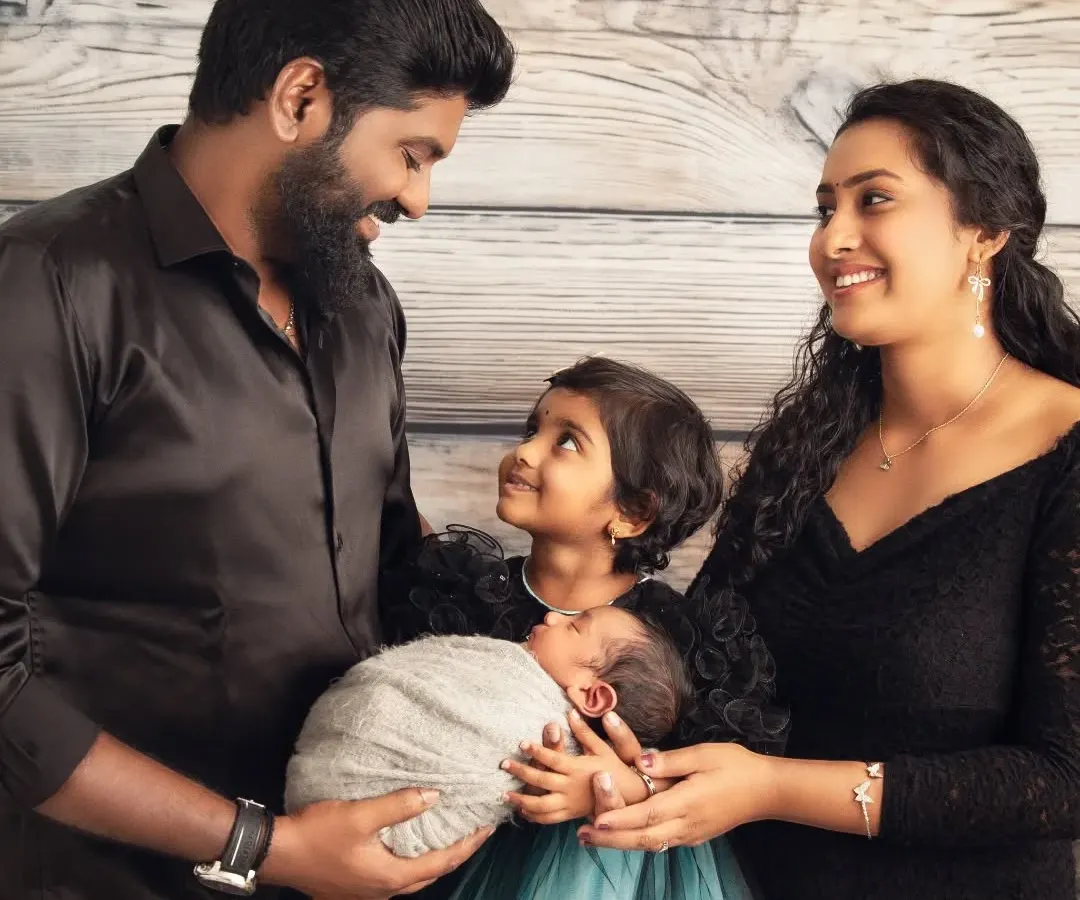 A new baby brings a new dimension of love to a family. I love capturing these early connections, with parents and siblings gazing at the newest member. This is a complete family portrait, a memory for everyone to cherish.