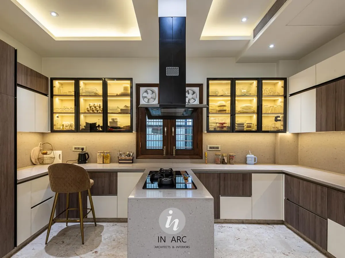 The kitchen is where memories are homemade. I designed this space to be a gathering place, balancing a modern modular layout with warm, inviting details like backlit cabinetry and an island for family and friends to gather around.