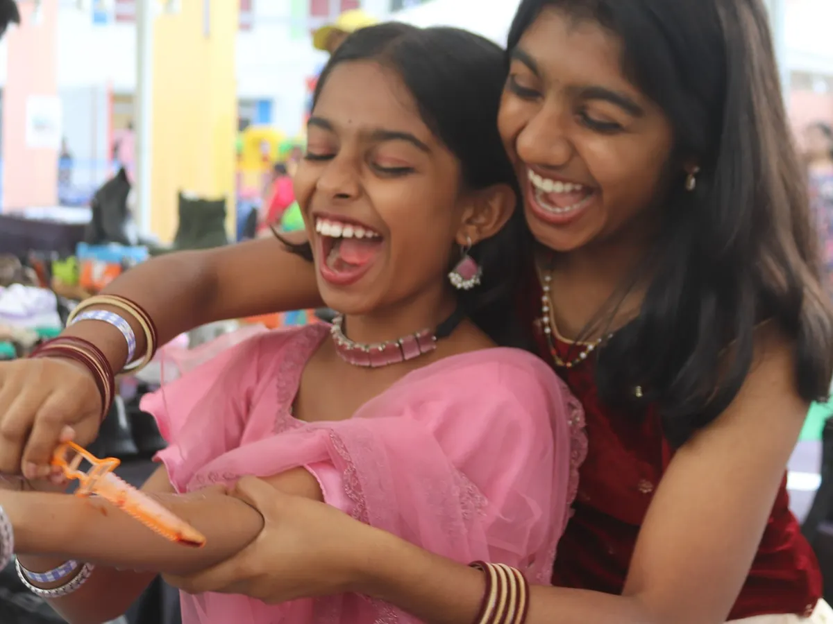 This is the sound of science being FUN! These two couldn't stop laughing while creating a super realistic (but totally fake!) SFX wound. It's not just an activity; it's a core memory in the making.
