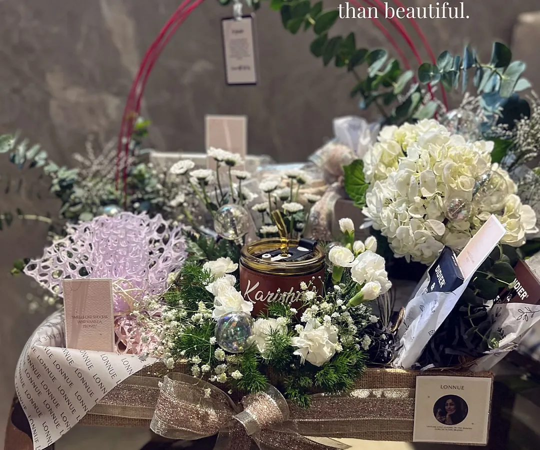 Some gifts must be more than beautiful; they must tell a story. This hamper for a brand launch was completely reimagined to honor the founder's journey, using hydrangeas, custom quotes, and layered textures to reflect the elegance of her new brand.