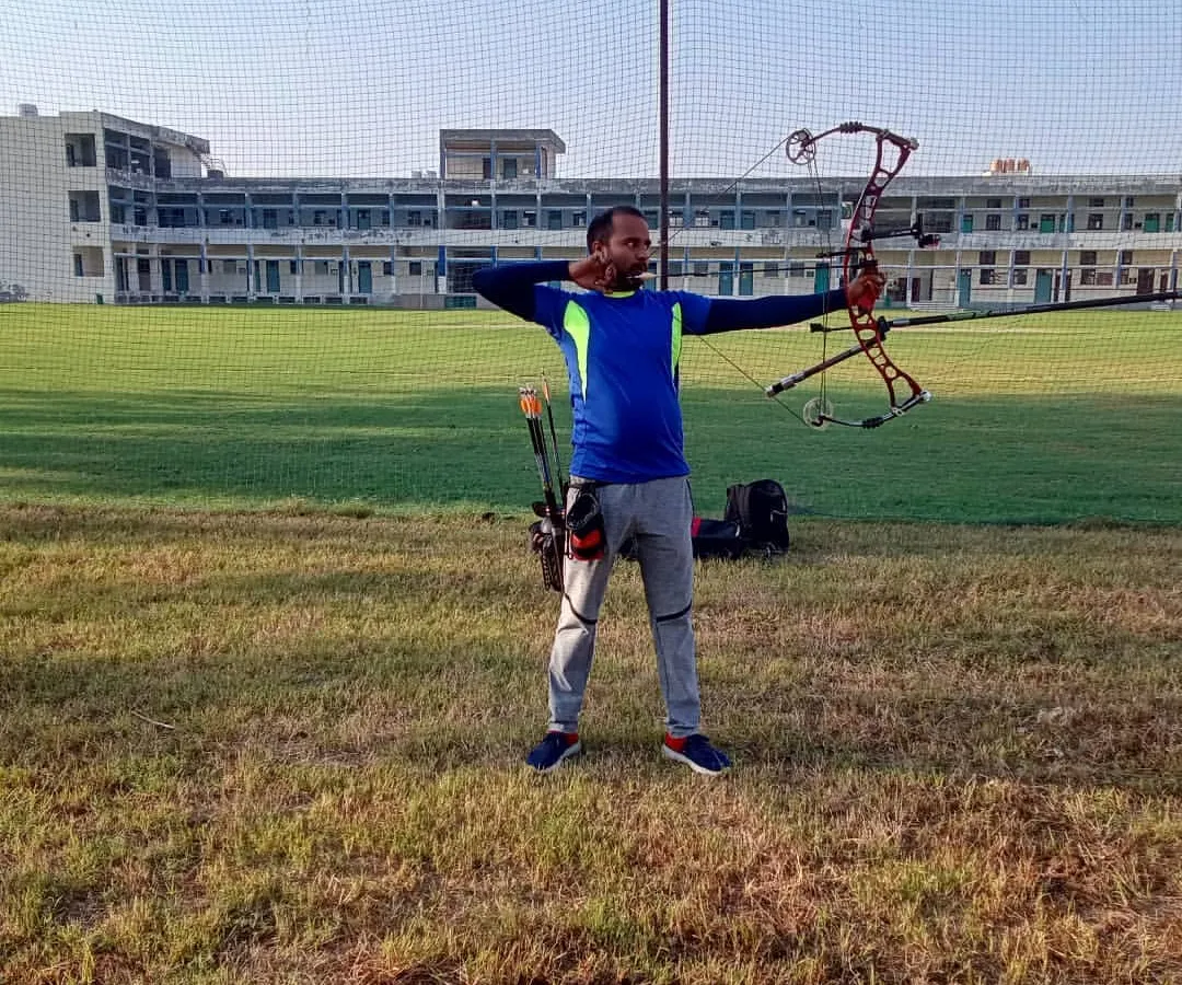 An archer takes aim with a compound bow during a practice session on our open field. I provide coaching that focuses on proper form, safety, and aiming techniques for both beginners and experienced archers.