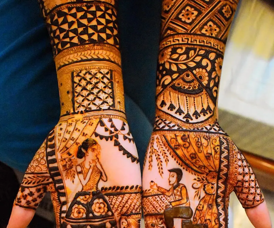 I love bringing wedding rituals to life, like this ring ceremony scene captured in henna. This custom portrait mehndi shows the groom placing the ring on the bride's finger, making it a truly personal and memorable design for her special day.