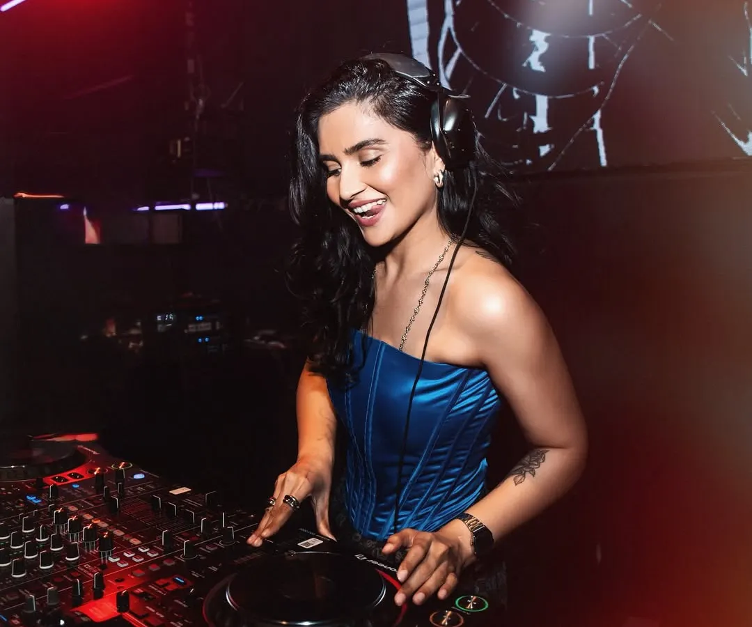 Caught in my element. This is me in the zone, mixing tracks and feeling the energy of the crowd at a recent gig in Hyderabad. I focus on every beat to make sure the dancefloor is always moving.