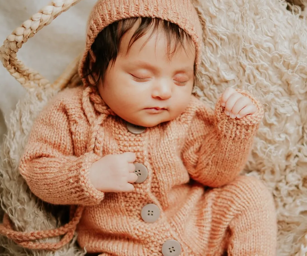 Those first few weeks are a blur of tiny yawns and peaceful dreams. I create a safe, warm space in my studio to capture your newborn's delicate features while they sleep, preserving the magic of their earliest days.
