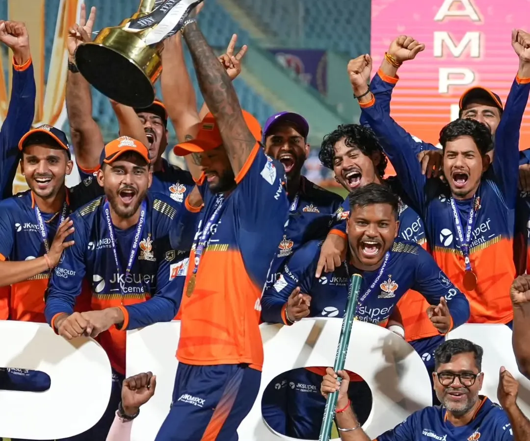 The moment of pure victory. Capturing the Kashi Rudras team lifting the UPT20 League trophy is about documenting the raw emotion and celebration that follows a hard-fought win. This is the ultimate payoff.