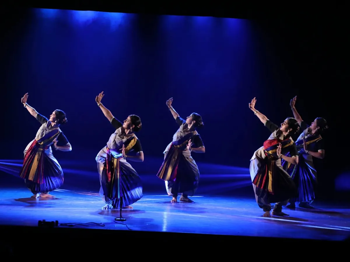 A moment of synchronized energy from my group production 'Ikshana'. The dramatic lighting and precise formations capture the urgency of our performance, which uses Bharatanatyam to explore the narrative of climate change.