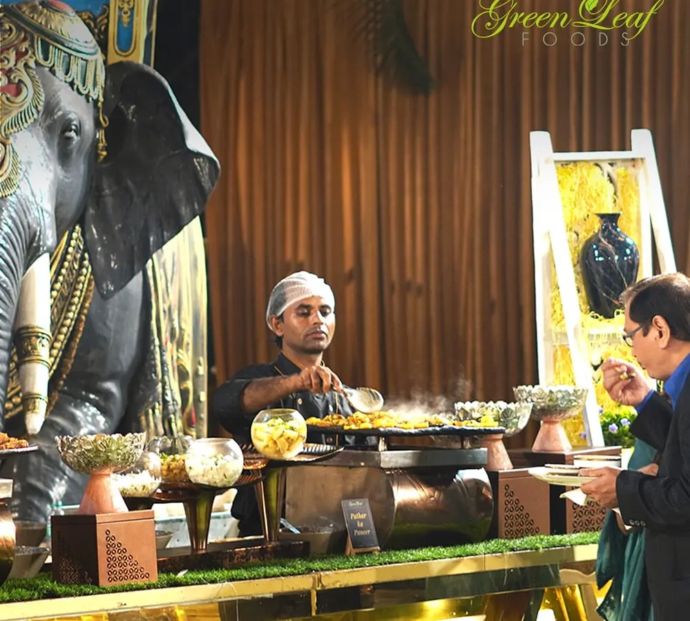 A live food counter is the heart of any wedding celebration. Here, one of my chefs prepares a fresh, sizzling dish right before the guest's eyes, creating an interactive and engaging dining experience that everyone loves.