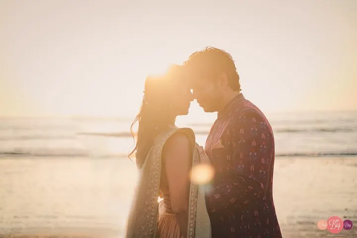 As the sun melts into the sea, their silhouettes tell a story of quiet love. We chase this golden hour light to create timeless, romantic portraits.