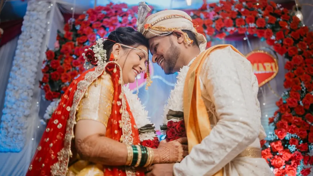 A quiet moment of connection between the bride and groom. We focus on capturing these unscripted, intimate exchanges that truly define the love you share on your wedding day.