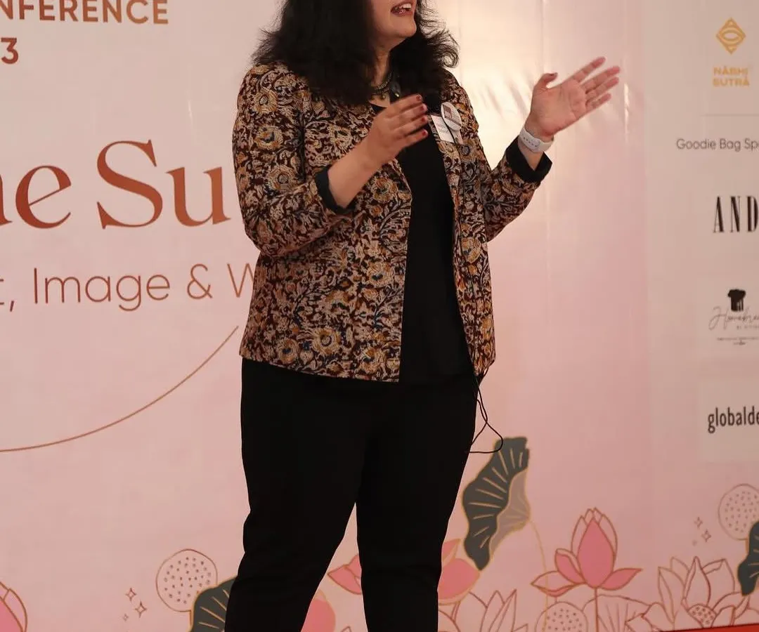 Here I am, speaking at a national conference on how to command the stage with confidence. My leadership presence coaching helps managers and executives own the room, connect with their audience, and deliver their message with authority and authenticity.