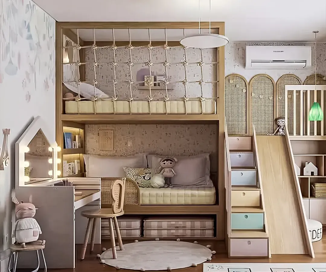 This whimsical kids' room is built for fun and function, featuring a custom loft bed complete with a safety net, a playful slide, and built-in storage drawers. We also integrated a compact vanity and desk area, making it a space that encourages both creativity and organization.