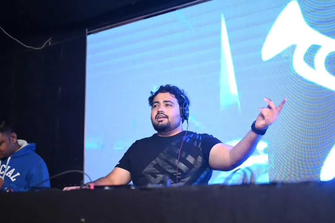 In my element, reading the crowd and lining up the next track. A great corporate DJ knows how to connect with the audience, and for me, it's all about that interaction from behind the console.