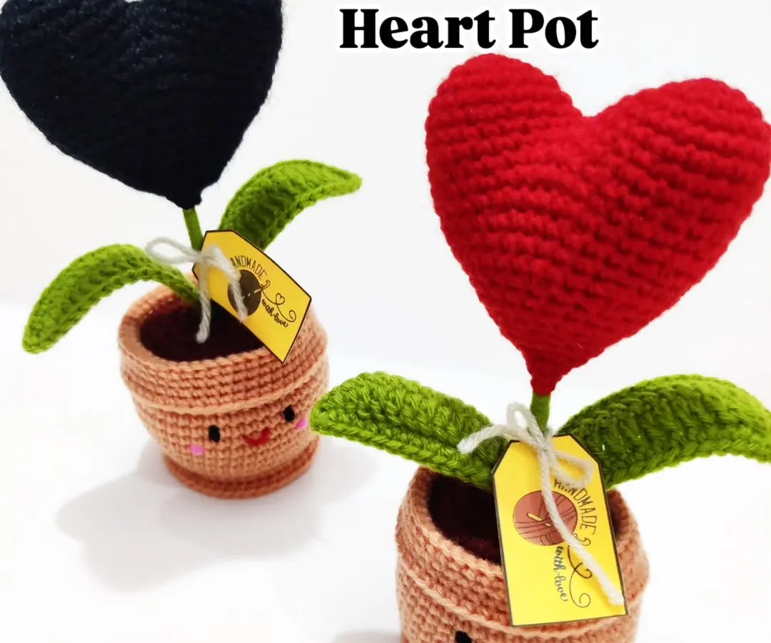 Meet my most popular desk buddies, the crochet heart pots. Available in classic red or moody black, these little pots with their cute smiley faces are perfect for adding a bit of personality to your workspace or gifting to a friend.