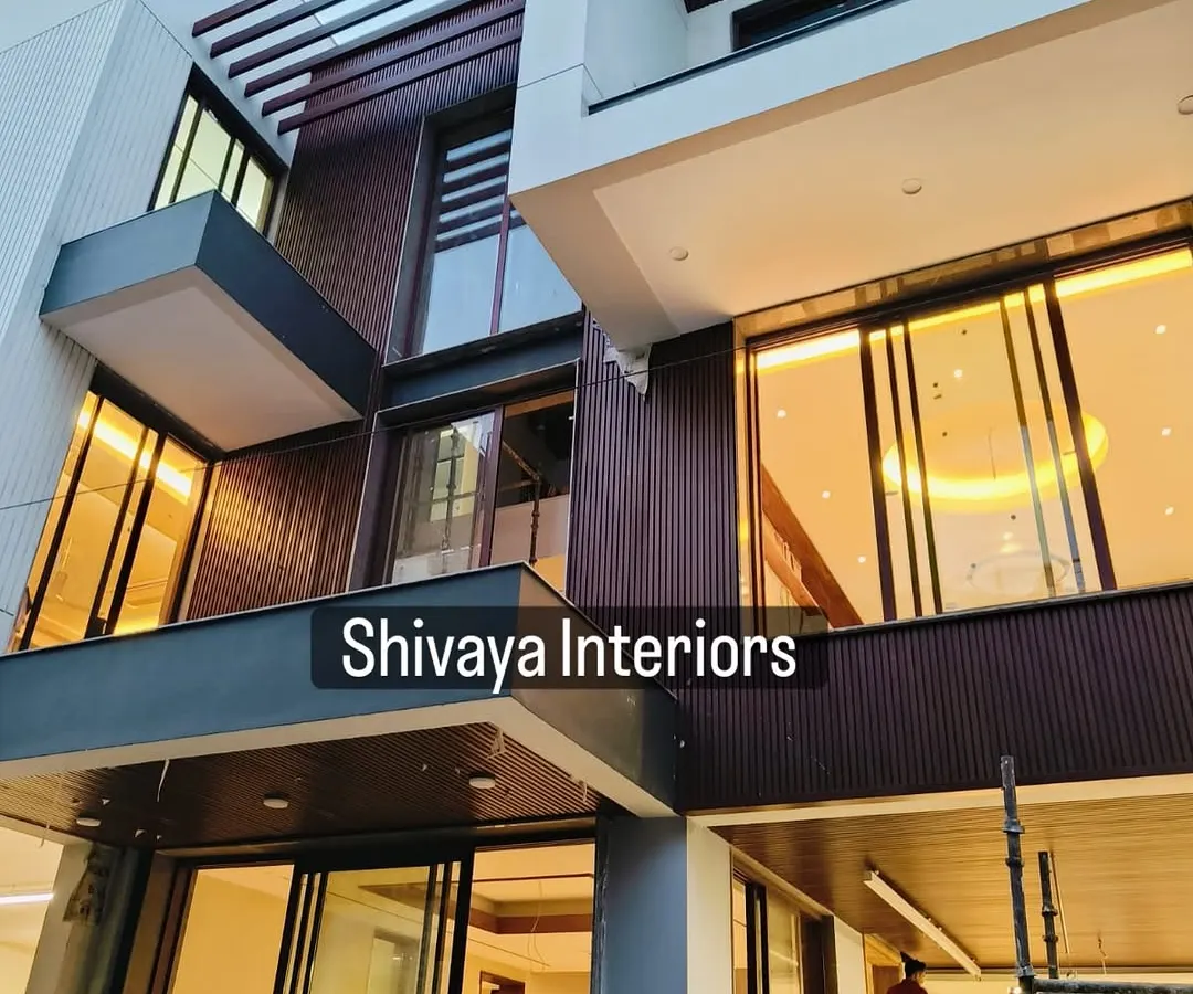 The right facade design comes alive at night with strategic lighting. For this project, I installed vertically grooved, deep-toned cladding that interacts beautifully with both natural and artificial light, highlighting the building's modern architectural lines.
