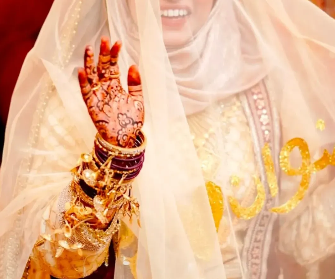 The pure joy of a bride on her wedding day. Seeing this smile is why I pour my heart into every design. This is a look at the beautiful, rich stain of my organic henna after it has fully developed.