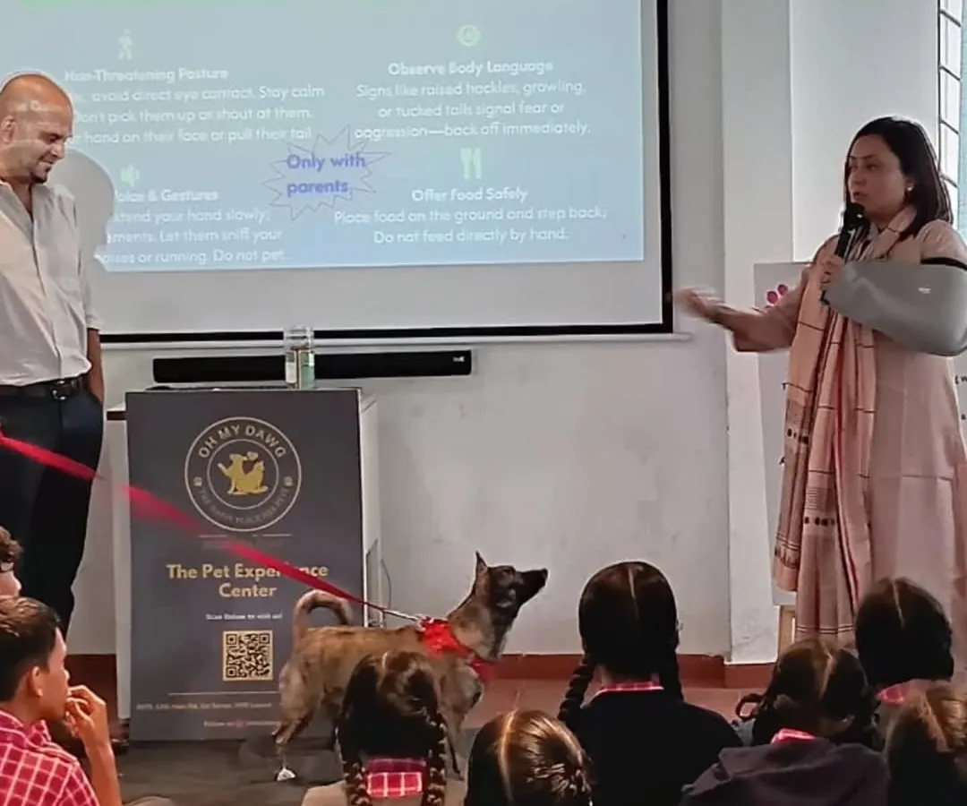 Here I am, arm in a sling and all, conducting a compassion workshop at Lawrence High School. An accident couldn't stop me from sharing my passion. It's so important to teach children how to safely and respectfully interact with community animals, and my own Indie, Miney, is the perfect co-teacher.
