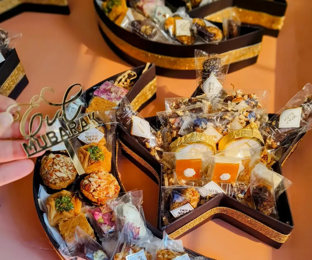 My 'Chand Taara' gourmet hamper is a favorite for Eid celebrations. The unique crescent and star shape is filled with traditional sweets like baklava and premium dates, making it a visually stunning and delicious gift.