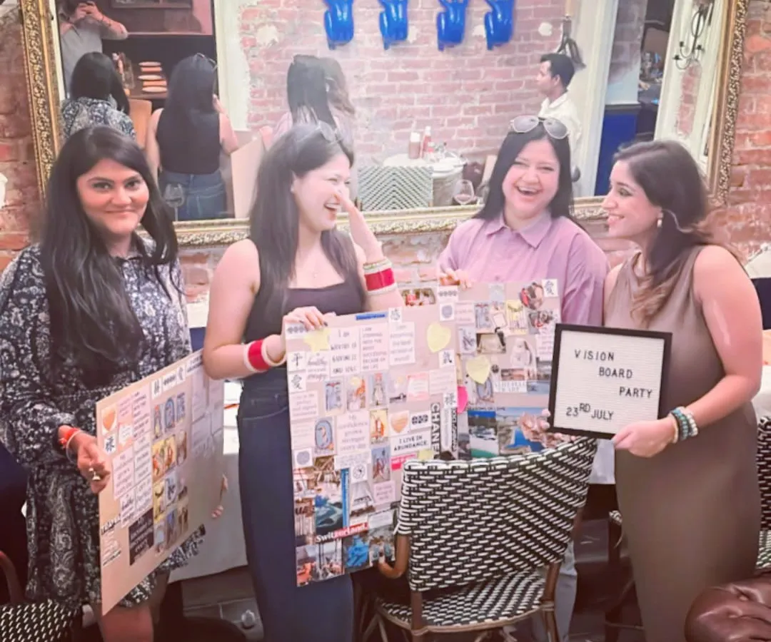 Look at these happy faces and their finished vision boards! This is the moment it all comes together. Each board is a unique visual prayer, a tangible reminder of the goals and dreams we set out to achieve.