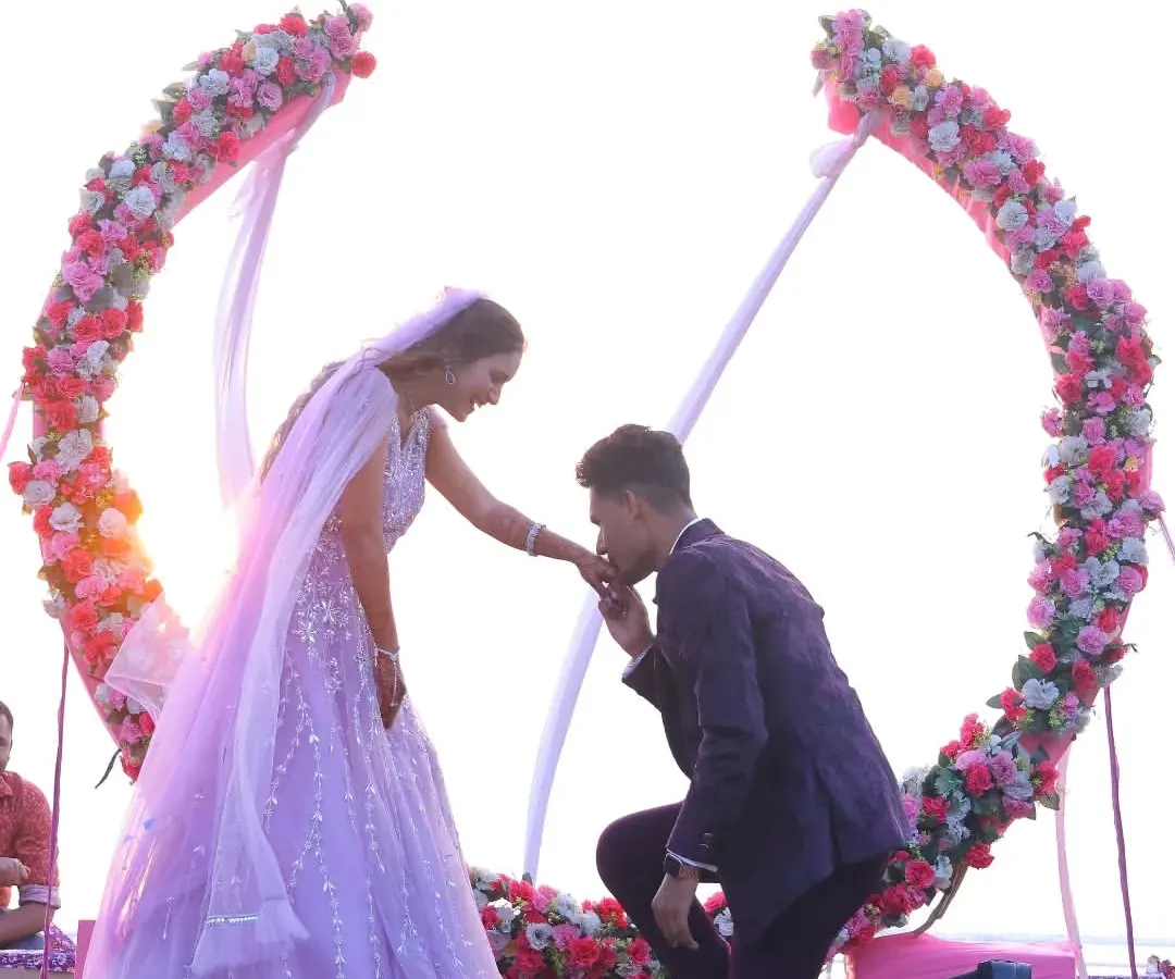 A beautiful beachside proposal with a stunning floral arch. We help you plan and capture these once-in-a-lifetime moments, ensuring your engagement photos are as breathtaking as the proposal itself.
