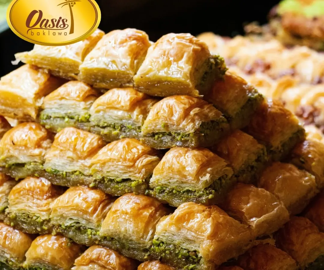 A mountain of our classic pistachio baklava. Each piece is a perfect square of flaky phyllo pastry, packed with premium nuts and sweetened with honey, not sugar.