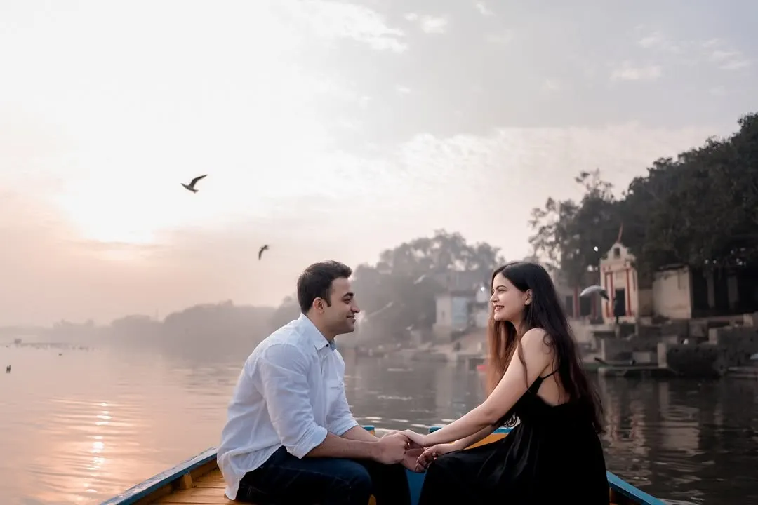 A quiet moment on the water as the sun sets. I use the soft, golden hour light to paint a serene and romantic picture, capturing the peaceful feeling of being with the one you call home.